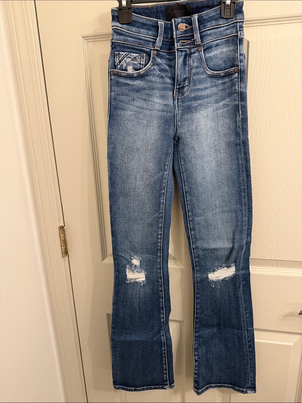 Woman’s buckle jeans boot cut